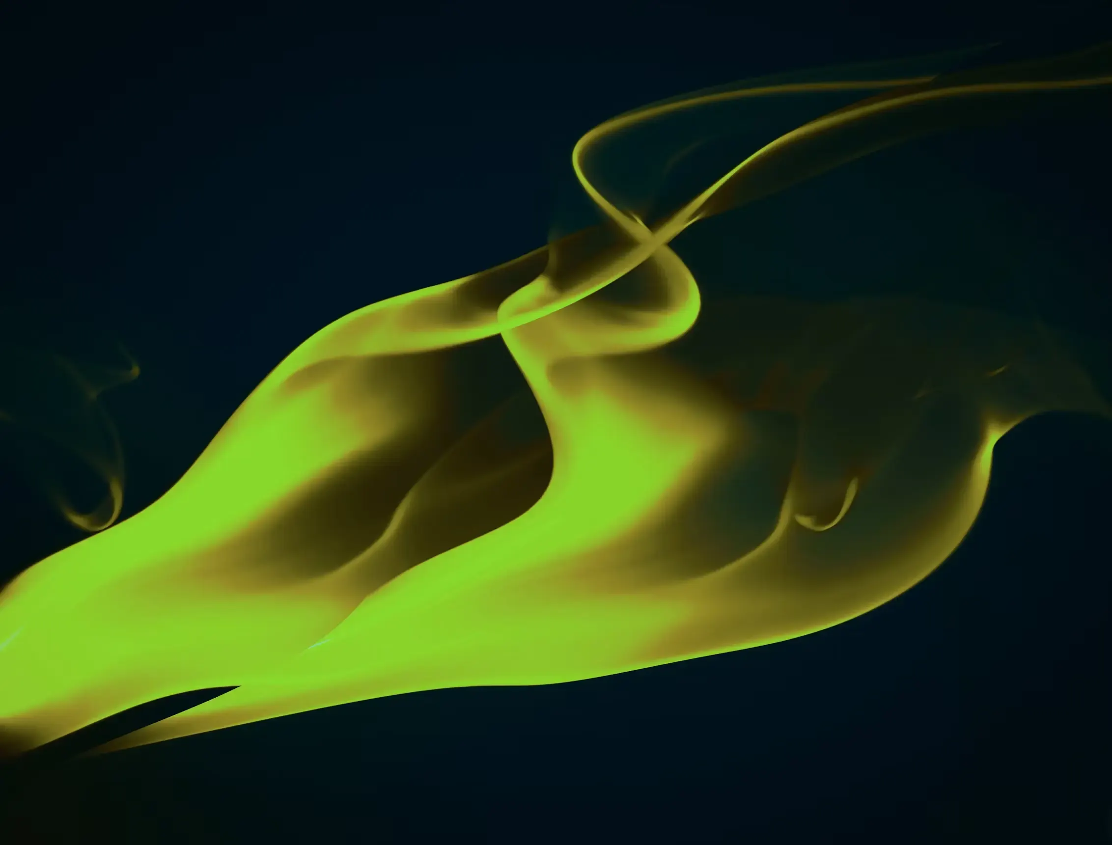 Una voluta di colore giallo-verde fluorescente dispiegata su uno sfondo quasi nero, con i bordi accesi e sottili fili che si arricciano nella parte superiore, come un pigmento sciolto in acqua sotto luce ultravioletta.